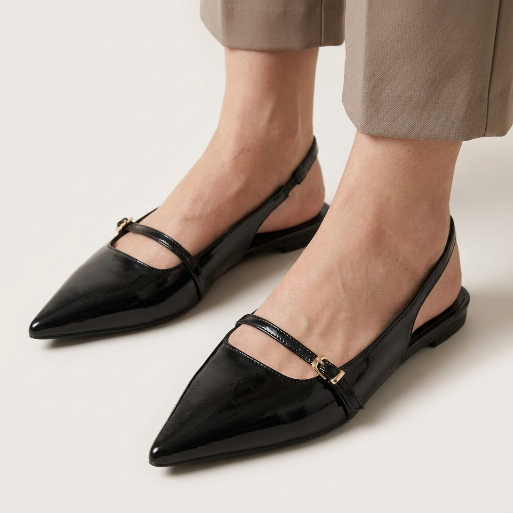 Black Patent Pointed-Toe Slingback Flats on model
