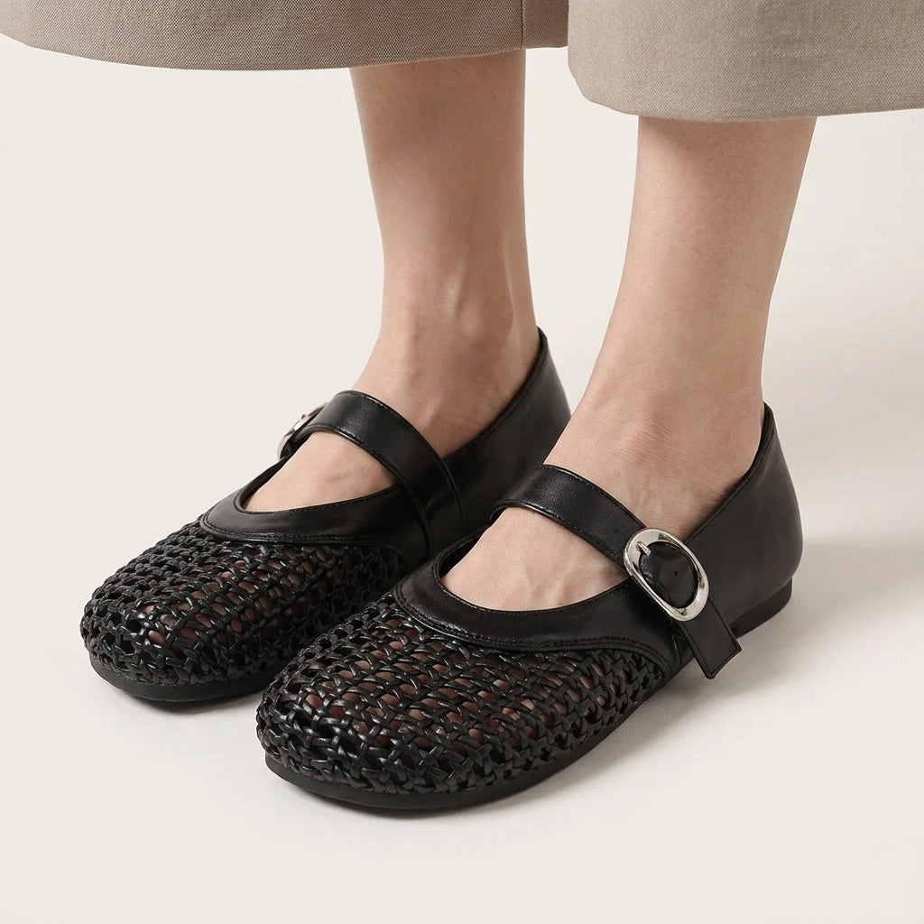 Women's woven mesh Mary Jane flats in black - worn on feet